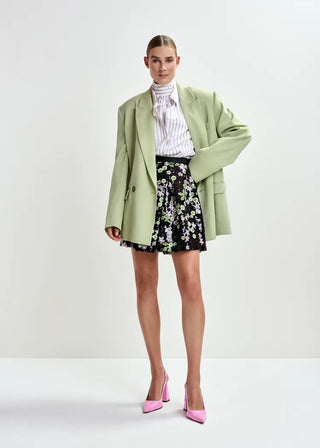 Black tulip-shape mini skirt with green and pink sequin embellishments